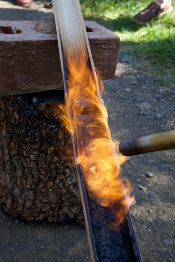 Burning the inside pith out of a culm