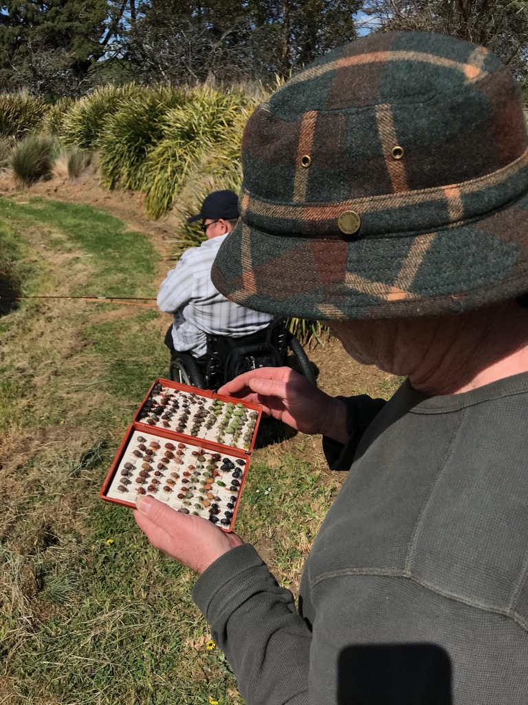 Casting Pool guide, Jim Morris, helps Hamish Murray christen his cane rod