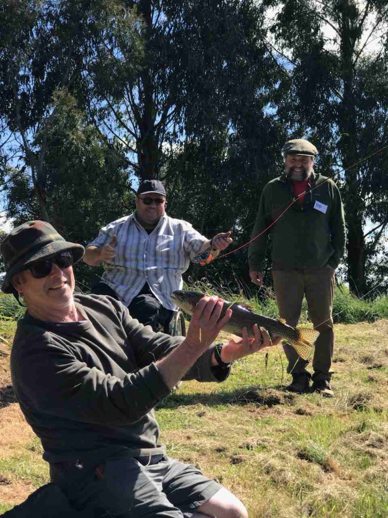Casting Pool guide, Jim Morris, helps Hamish Murray christen his cane rod